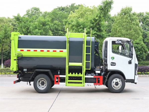 東風7方側裝掛桶壓縮垃圾車